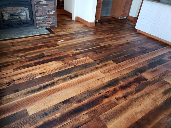 Custom hardwood floor installation in Montana home