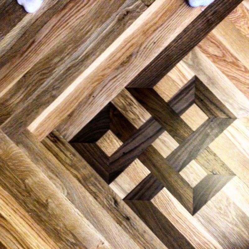 Custom Celtic knot inlay in mixed hardwood diagonal pattern