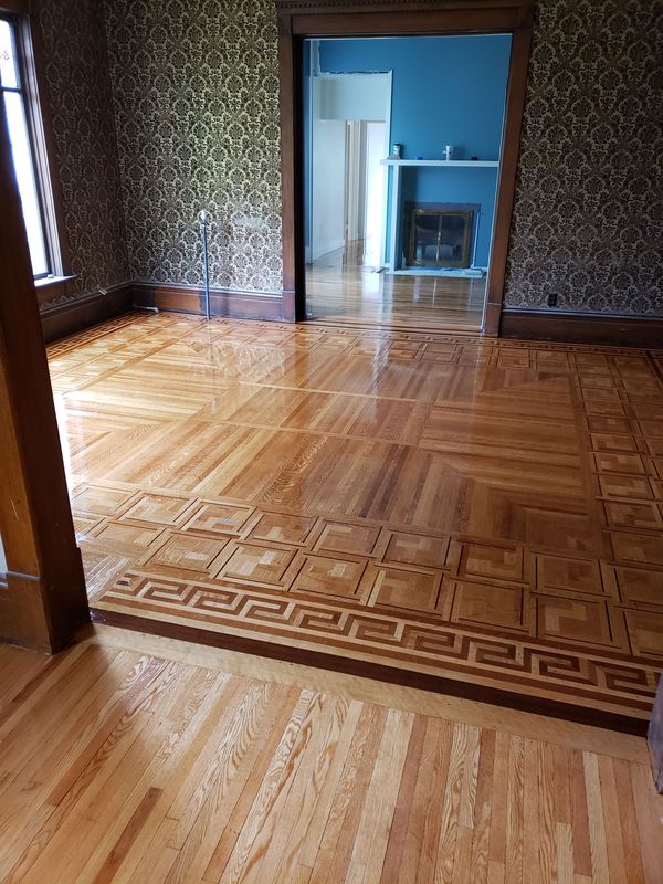 Refinished hardwood floor showing restored grain detail